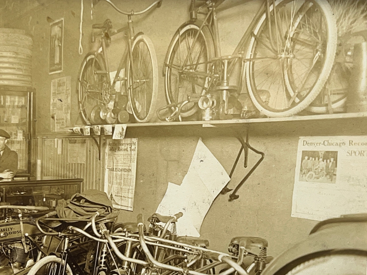 1915 Harley Davidson and Shaw Motorcycles in a Bicycle Shop Photo
