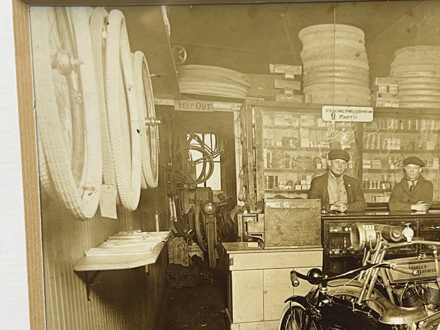 1915 Harley Davidson and Shaw Motorcycles in a Bicycle Shop Photo