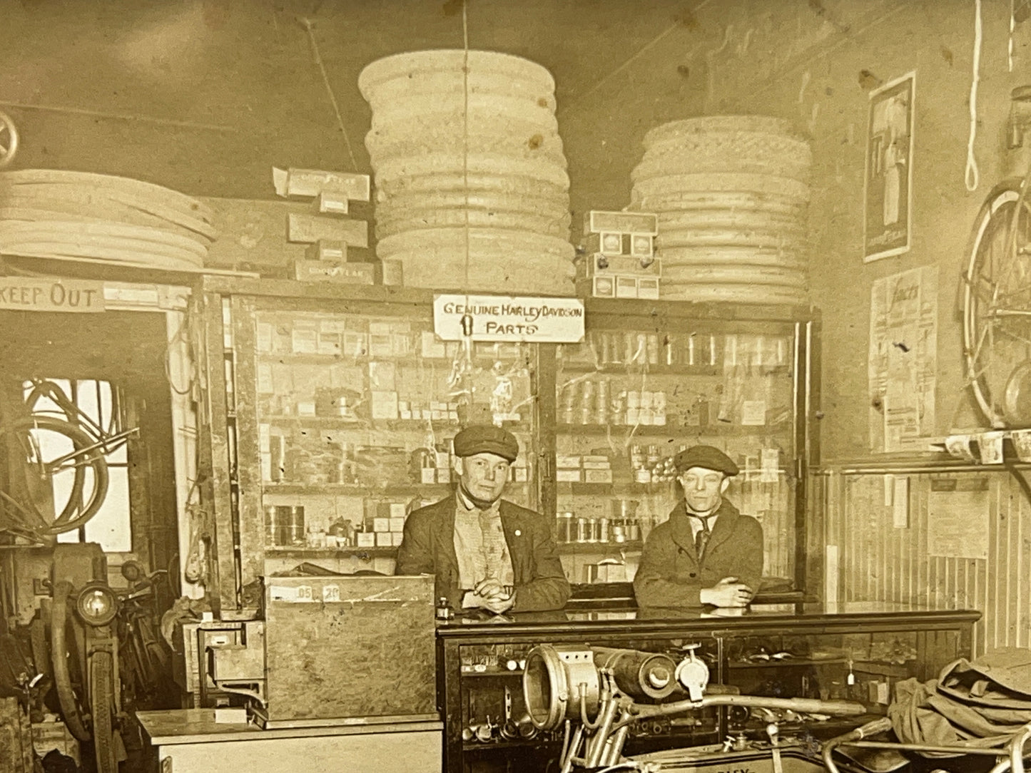 1915 Harley Davidson and Shaw Motorcycles in a Bicycle Shop Photo