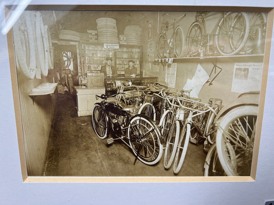 1915 Harley Davidson and Shaw Motorcycles in a Bicycle Shop Photo