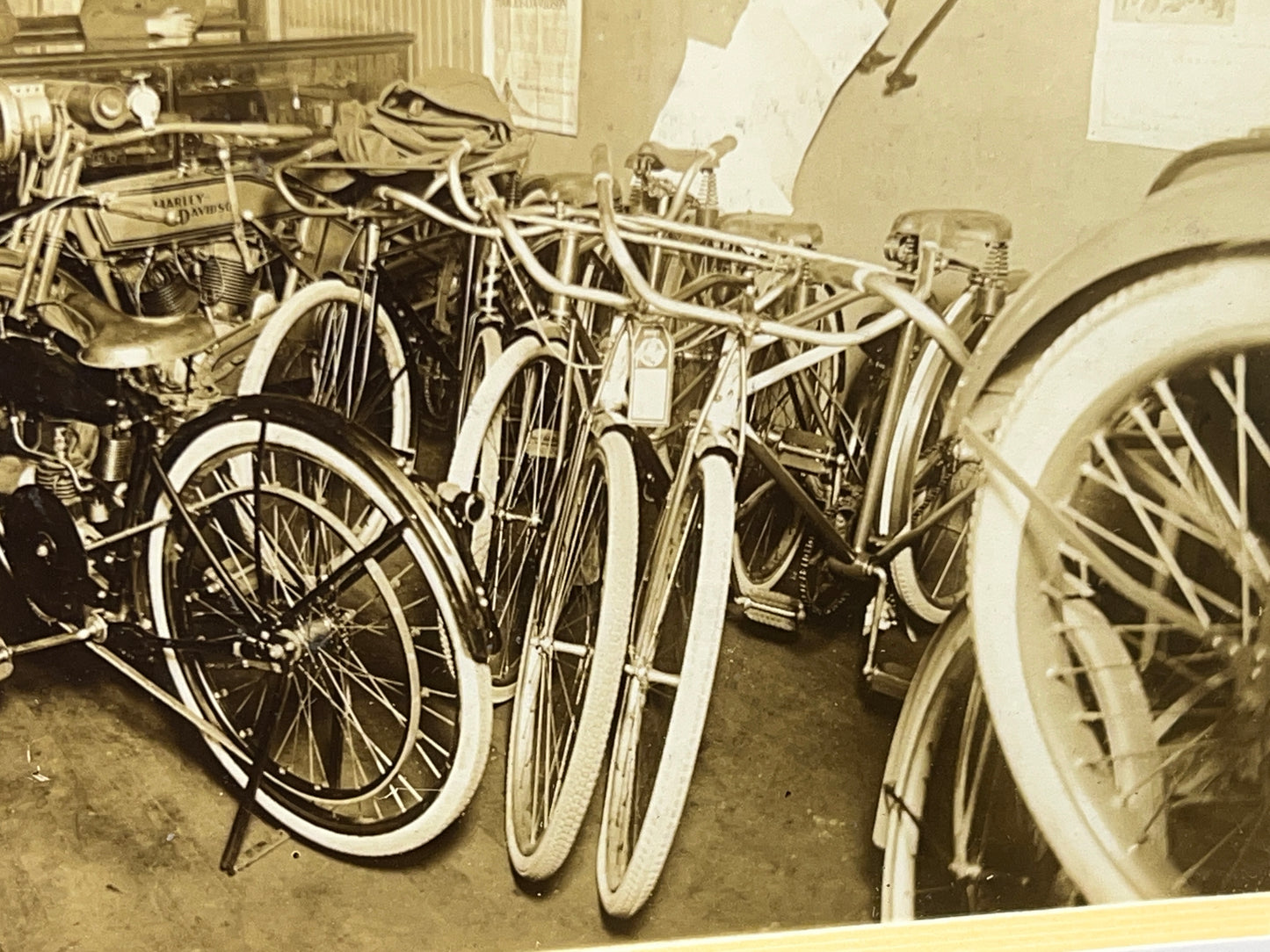 1915 Harley Davidson and Shaw Motorcycles in a Bicycle Shop Photo